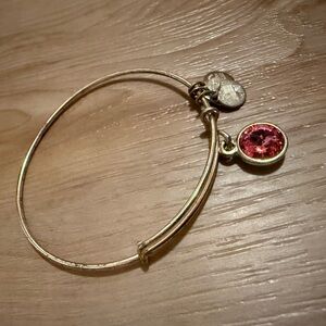 Gold Bangle Bracelet with Pink Charm
